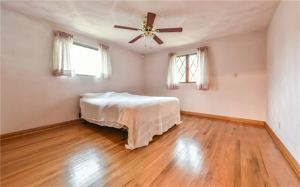 3891 Anderson Road Gibsonia, PA 15044 - Photo 14 of 22 Bedroom with gleaming hardwood.