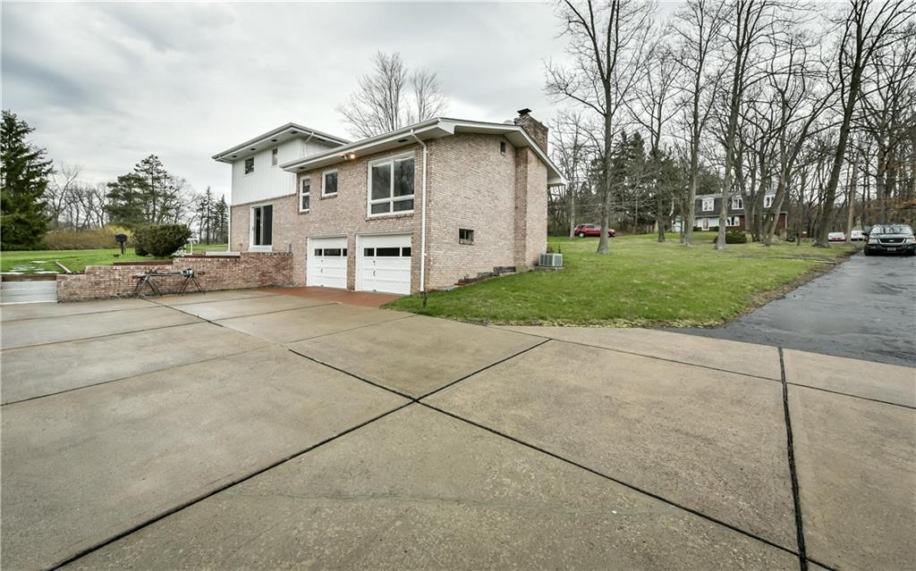 3891 Anderson Road Gibsonia, PA 15044 - Photo 18 of 22 Large concrete driveway area.