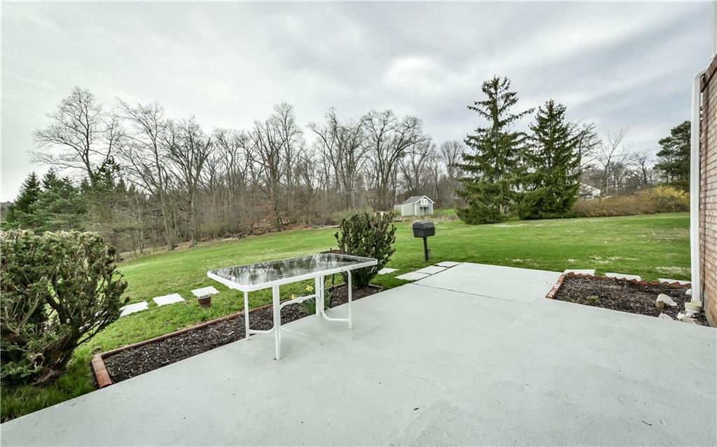 3891 Anderson Road Gibsonia, PA 15044 - Photo 19 of 22 Concrete patio overlooking rear and side yards.