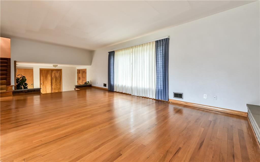3891 Anderson Road Gibsonia, PA 15044 - Photo 4 of 22 Very large living room with bay window and wood burning fireplace.