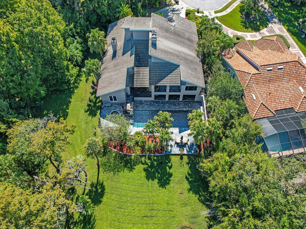 1609 Hampton Court Safety Harbor, FL 34695 - Photo 12 of 78 aerial view of a house with a yard