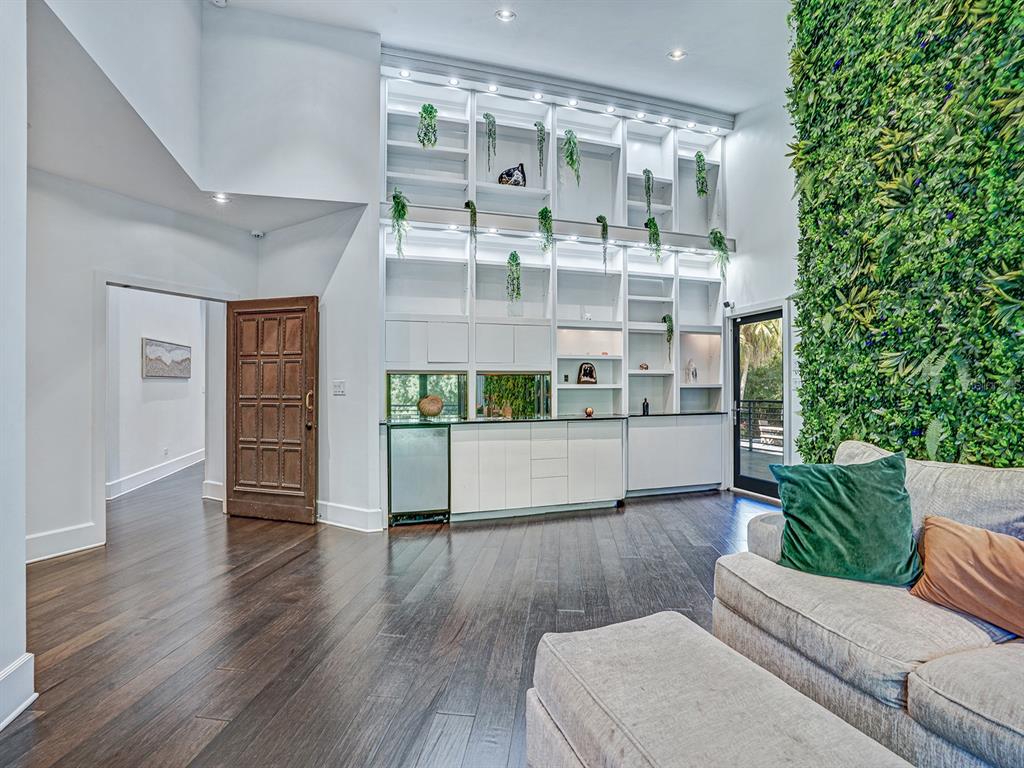 1609 Hampton Court Safety Harbor, FL 34695 - Photo 22 of 78 a living room with furniture and a wooden floor