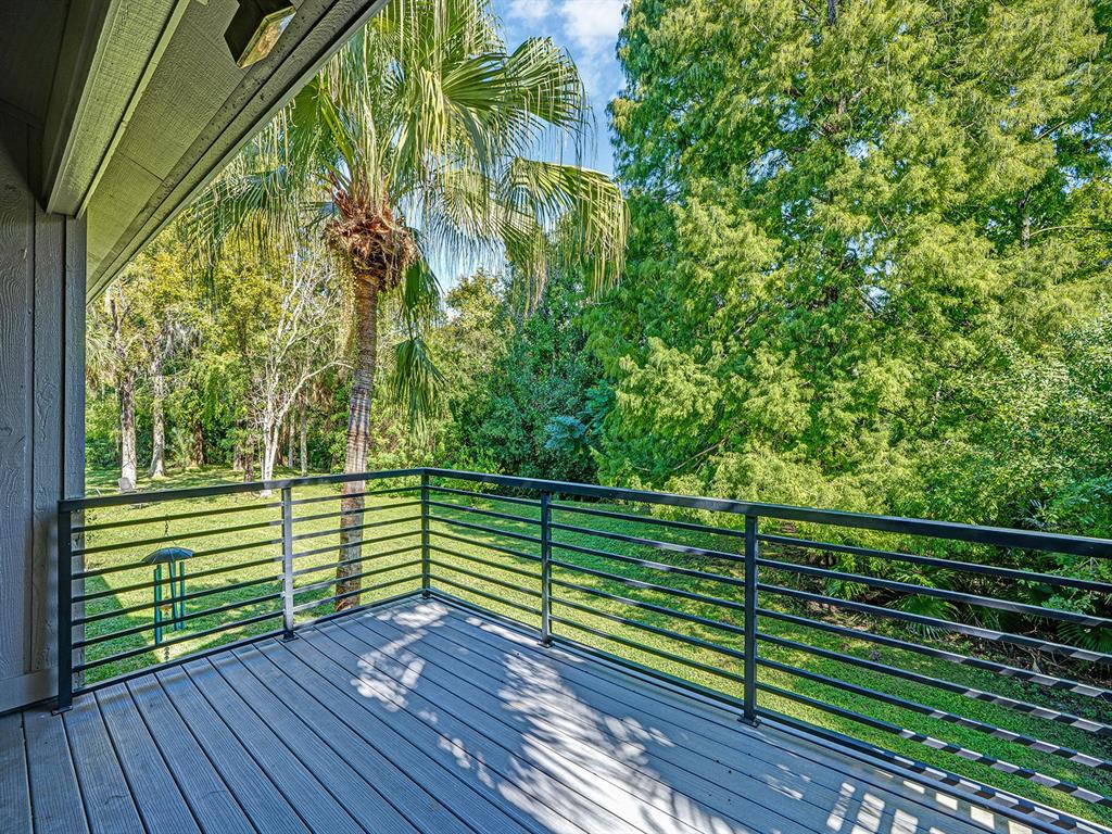 1609 Hampton Court Safety Harbor, FL 34695 - Photo 27 of 78 a view of a balcony with wooden floor