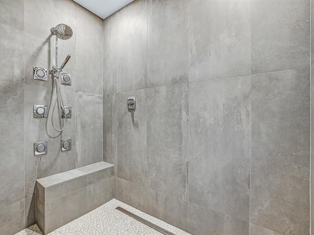 1609 Hampton Court Safety Harbor, FL 34695 - Photo 35 of 78 a bathroom with a shower and toilet