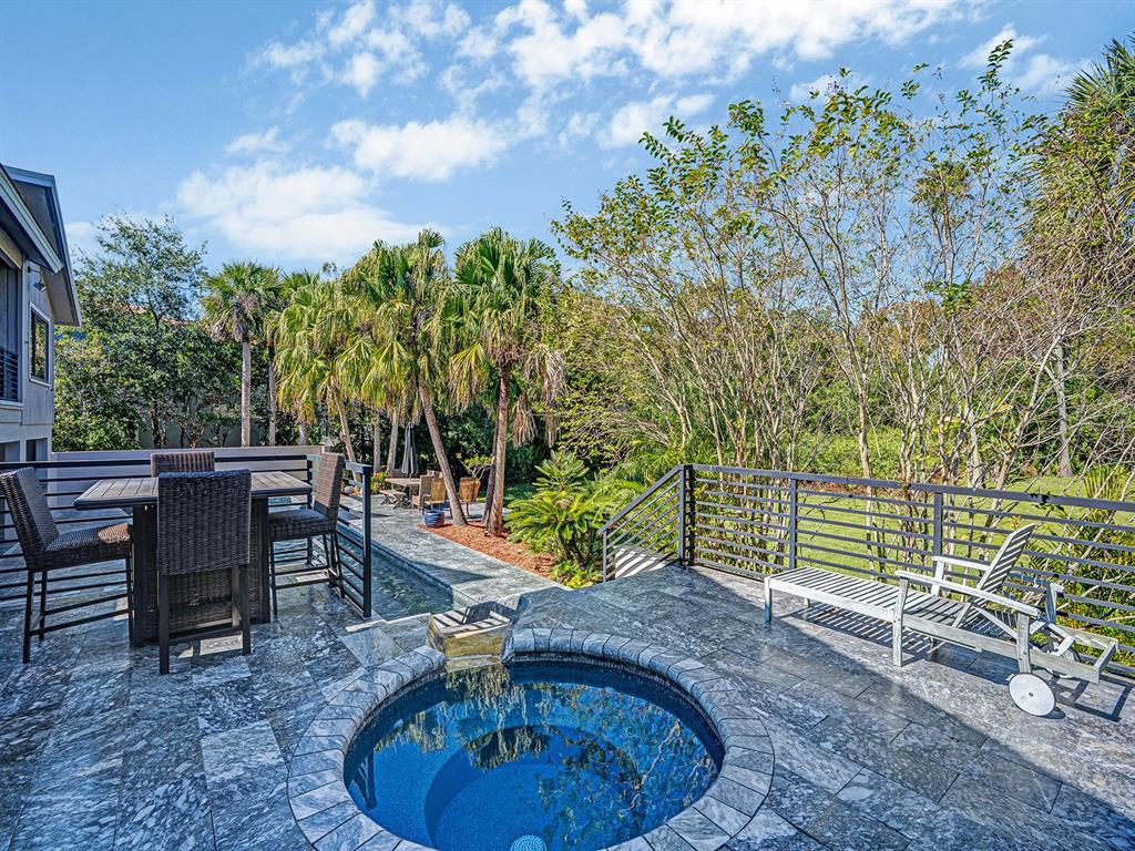 1609 Hampton Court Safety Harbor, FL 34695 - Photo 39 of 78 a view of a backyard with sitting area