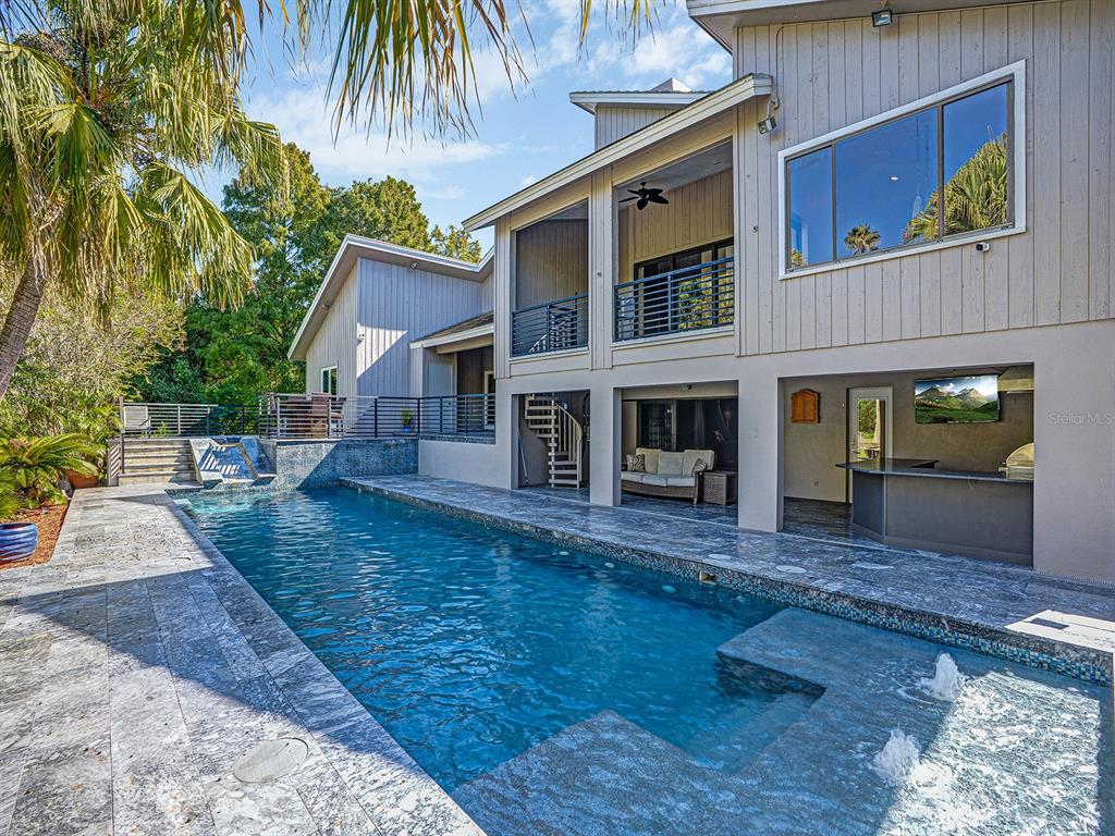 1609 Hampton Court Safety Harbor, FL 34695 - Photo 47 of 78 a front view of a house with garden