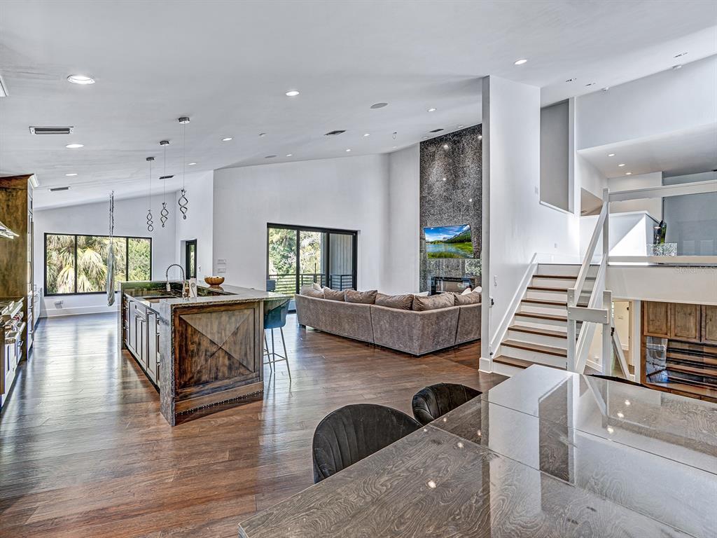 1609 Hampton Court Safety Harbor, FL 34695 - Photo 57 of 78 a living room with furniture and a table
