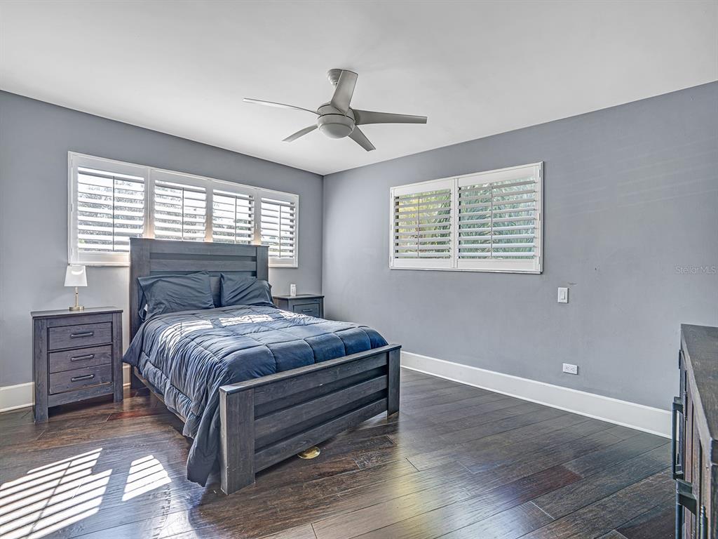 1609 Hampton Court Safety Harbor, FL 34695 - Photo 68 of 78 a bedroom with a bed and window