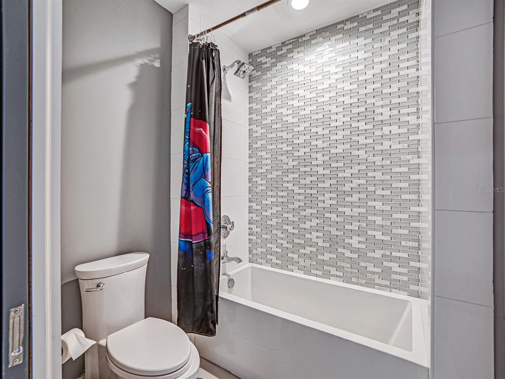 1609 Hampton Court Safety Harbor, FL 34695 - Photo 74 of 78 a bathroom with a toilet and a shower