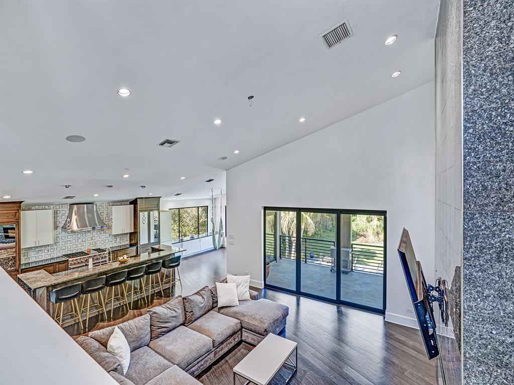 1609 Hampton Court Safety Harbor, FL 34695 - Photo 75 of 78 a living room with furniture and a floor to ceiling window