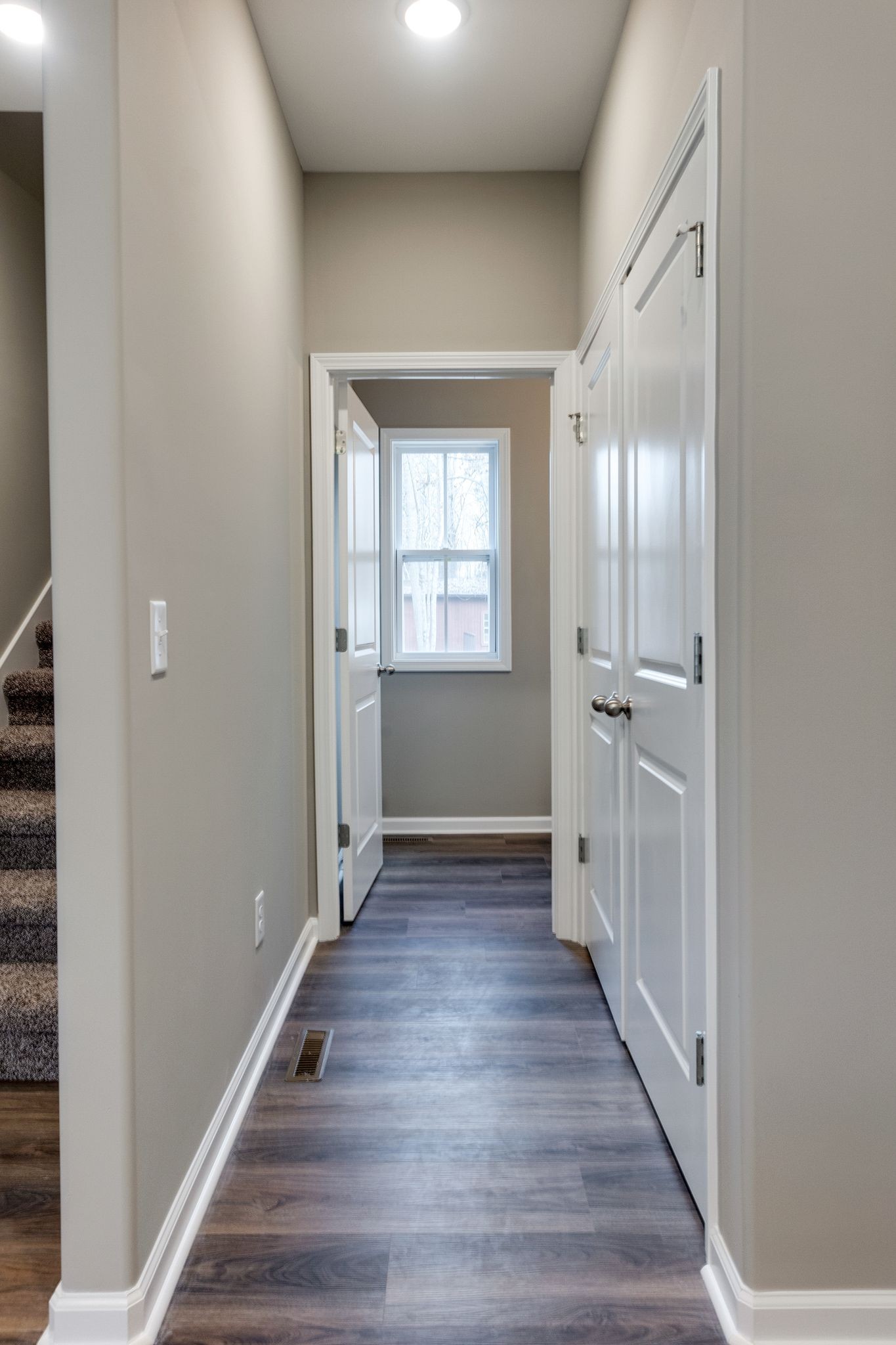 116 Shane-Lee Circle Dover, TN 37058 - Photo 6 of 33 a view of a hallway with wooden floor and a window