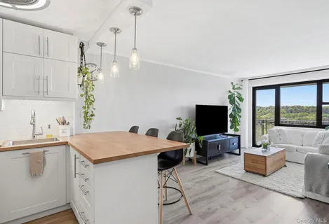 a kitchen with a table and chair