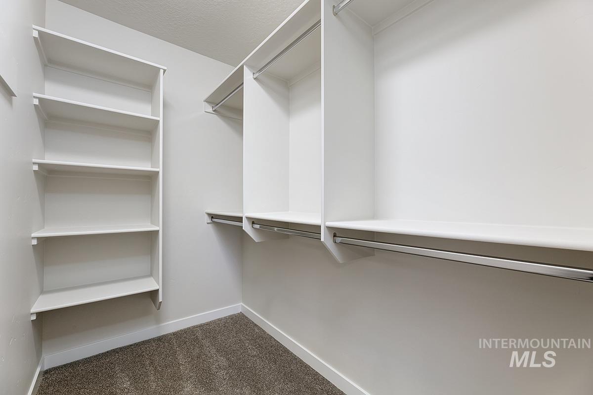 219 West Broyhill Street Meridian, ID 83642 - Photo 16 of 25 Spacious closet with dark colored carpet