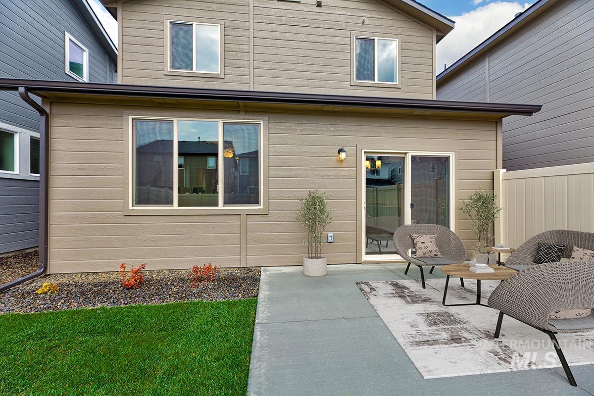 219 West Broyhill Street Meridian, ID 83642 - Photo 19 of 25 Rear view of property featuring a patio area