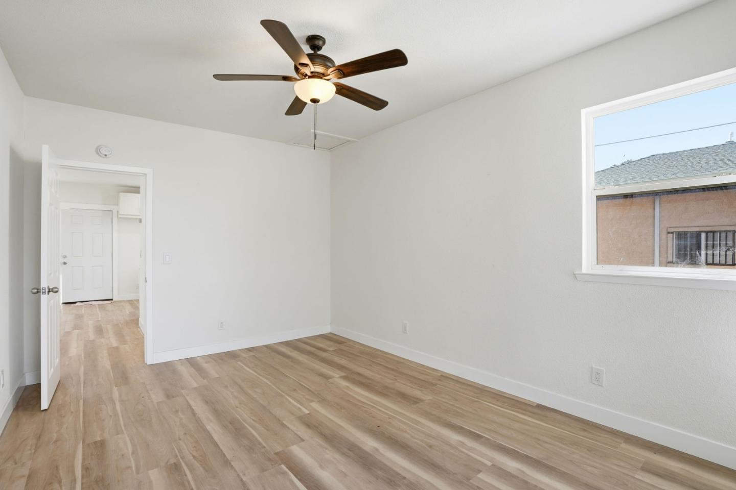 345 South Pilgrim Street Stockton, CA 95205 - Photo 13 of 27 wooden floor in an empty room