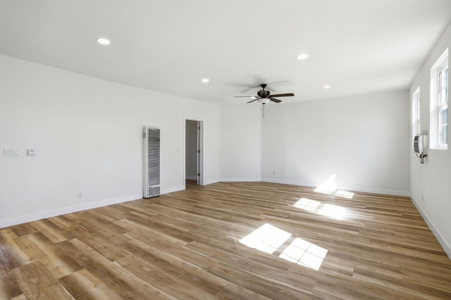 345 South Pilgrim Street Stockton, CA 95205 - Photo 6 of 27 a view of a big room with closet and windows