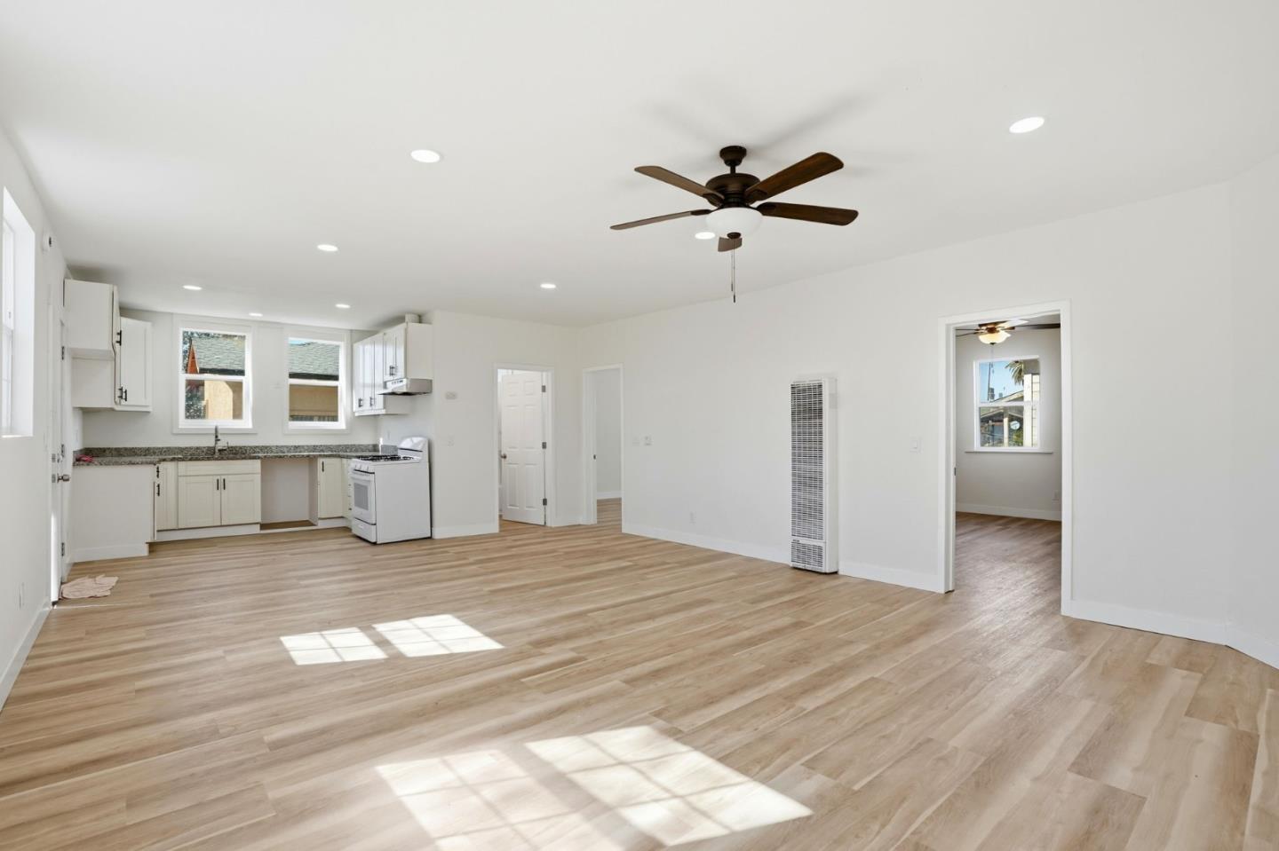 345 South Pilgrim Street Stockton, CA 95205 - Photo 10 of 27 a view of a kitchen with a sink and cabinet area