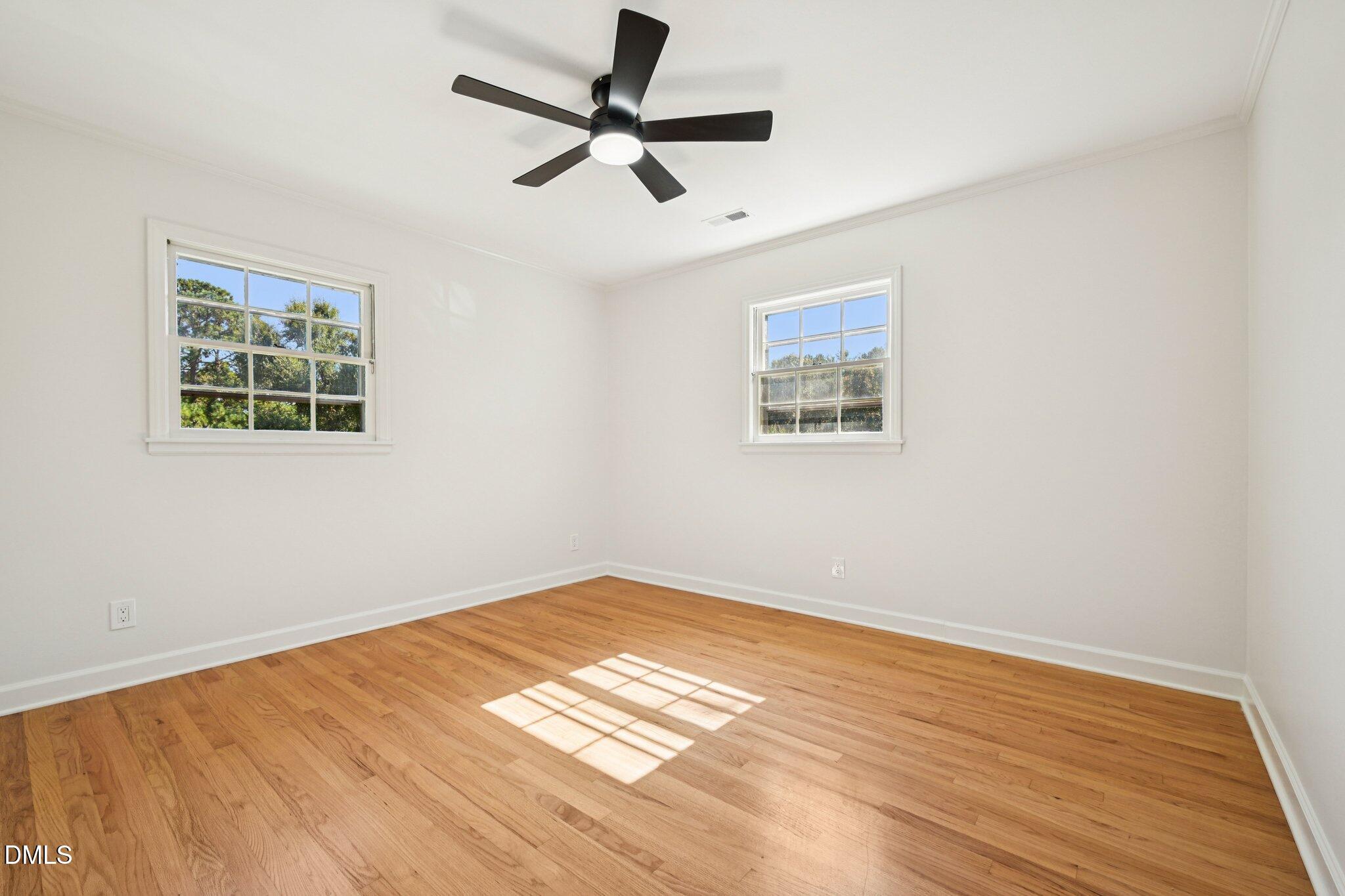 515 Uzzle Street Durham, NC 27713 - Photo 15 of 26 a view of empty room with wooden floor