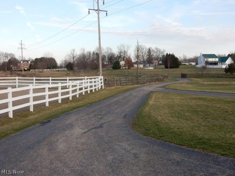 5490 Boneta Road Medina, OH 44256 - Photo 18 of 21 A view down the driveway looking at the pastures