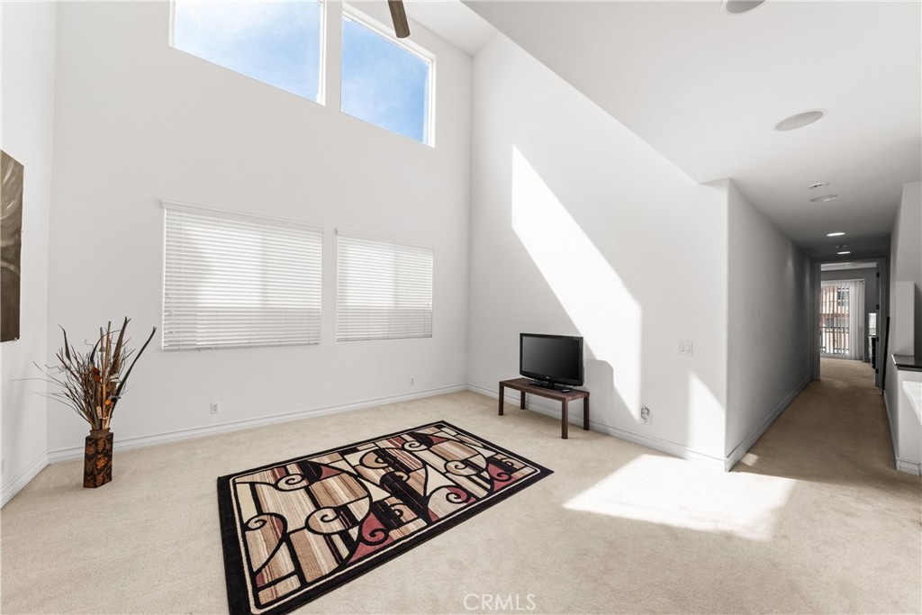 116 11th Street Huntington Beach, CA 92648 - Photo 20 of 28 a view of livingroom with furniture and window