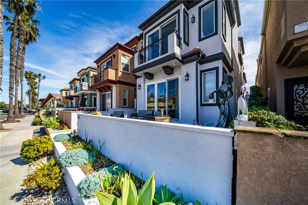 116 11th Street Huntington Beach, CA 92648 - Photo 6 of 28 a view of multiple house with outdoor space