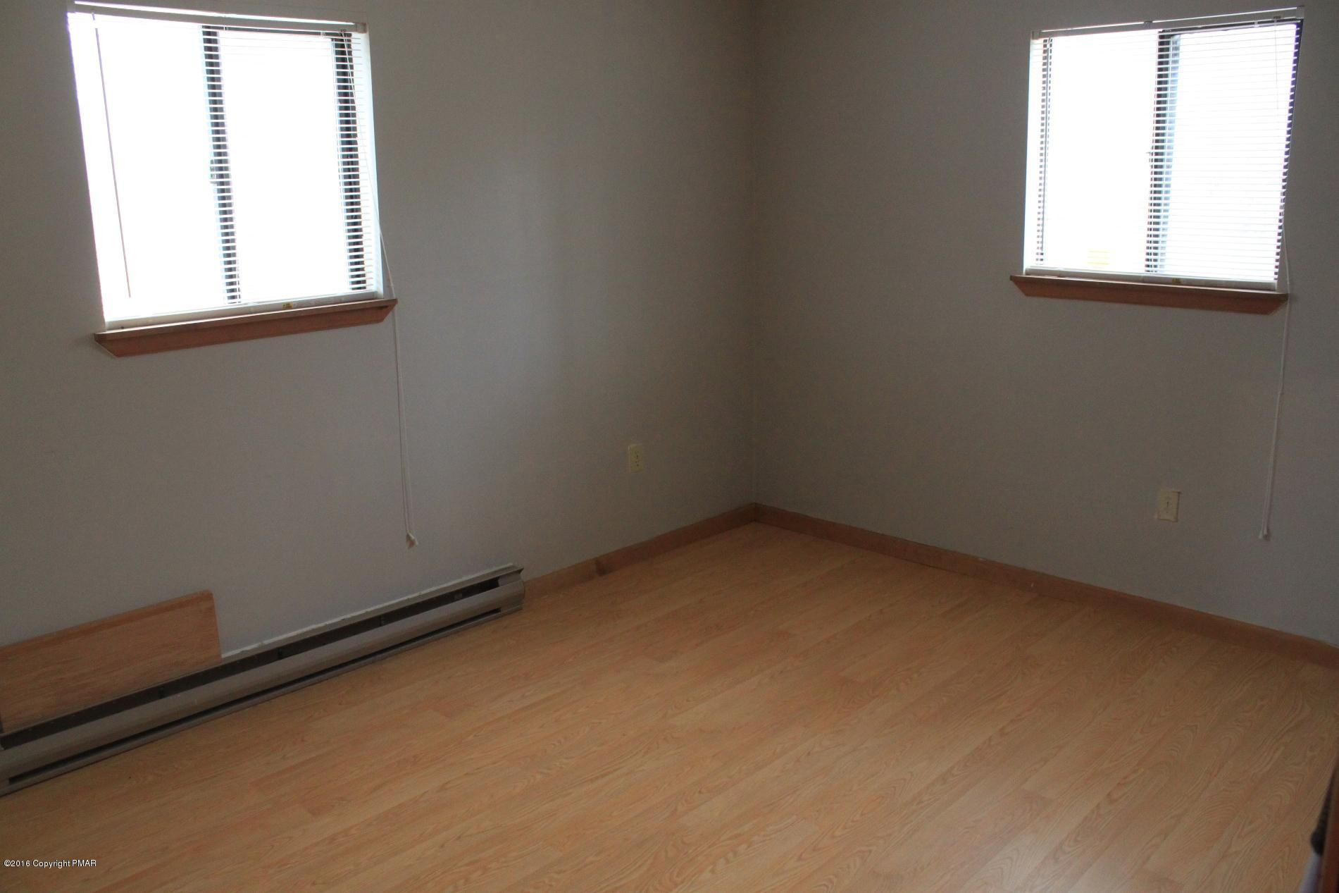 1421 Clover Road Long Pond, PA 18334 - Photo 12 of 26 an empty room with a window