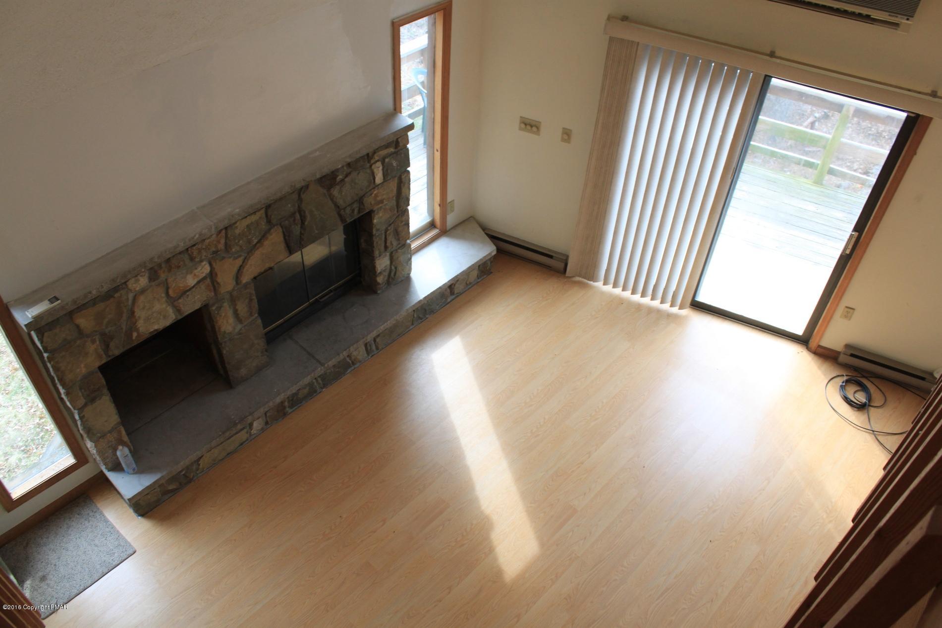 1421 Clover Road Long Pond, PA 18334 - Photo 14 of 26 a view of an entryway with wooden floor