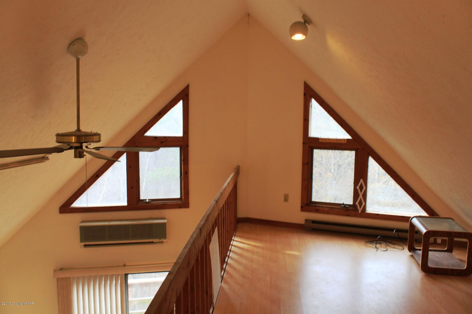 1421 Clover Road Long Pond, PA 18334 - Photo 16 of 26 a view of front door with stairs