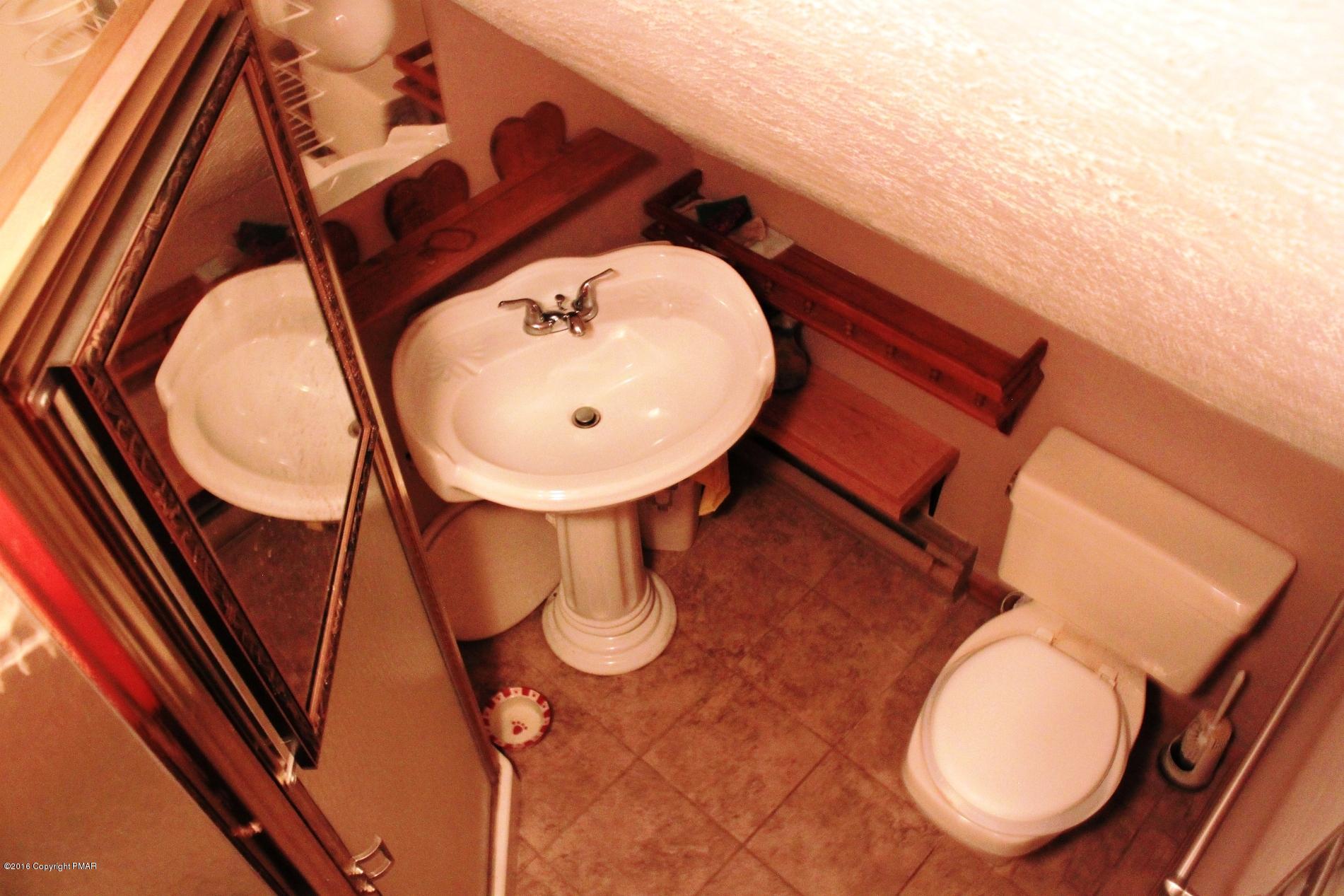 1421 Clover Road Long Pond, PA 18334 - Photo 17 of 26 a view of a balcony with wooden floor and a sink