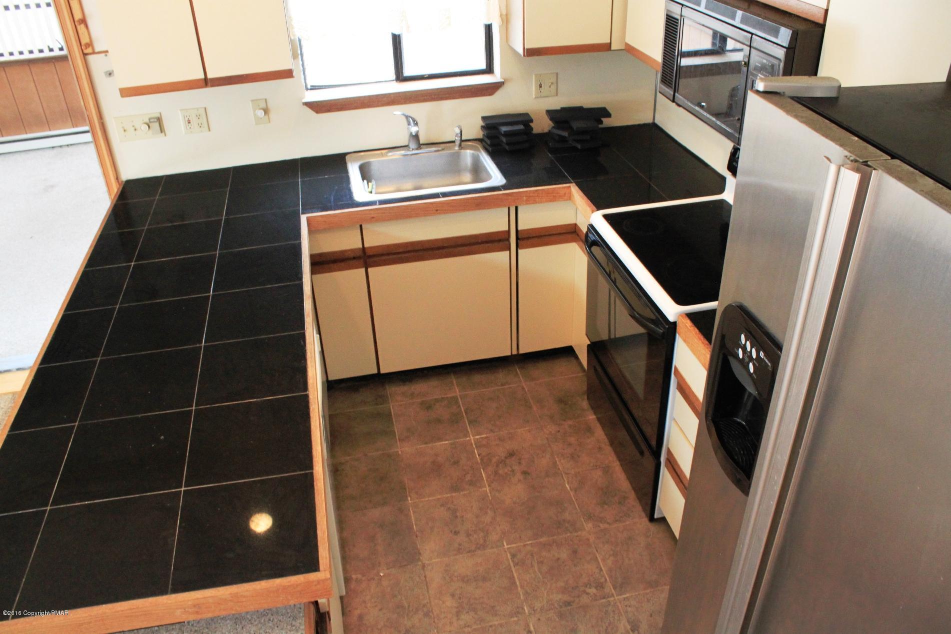 1421 Clover Road Long Pond, PA 18334 - Photo 7 of 26 a utility room with dryer and washer