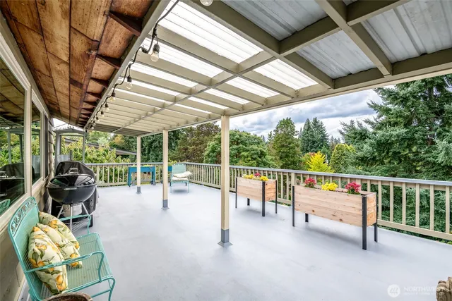 a view of a porch with furniture