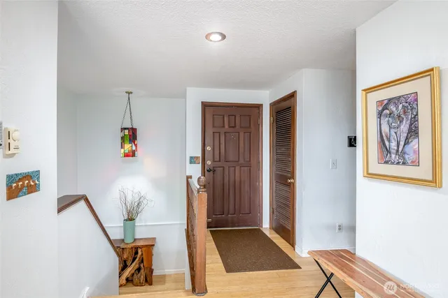 a view of an entryway with front door