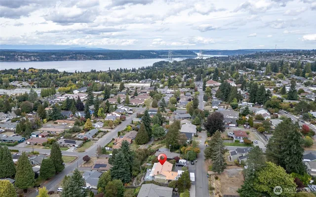 an aerial view of a house with a garden