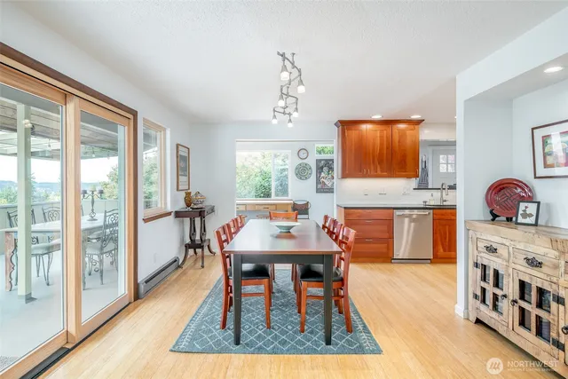 a workspace with furniture window and wooden floor