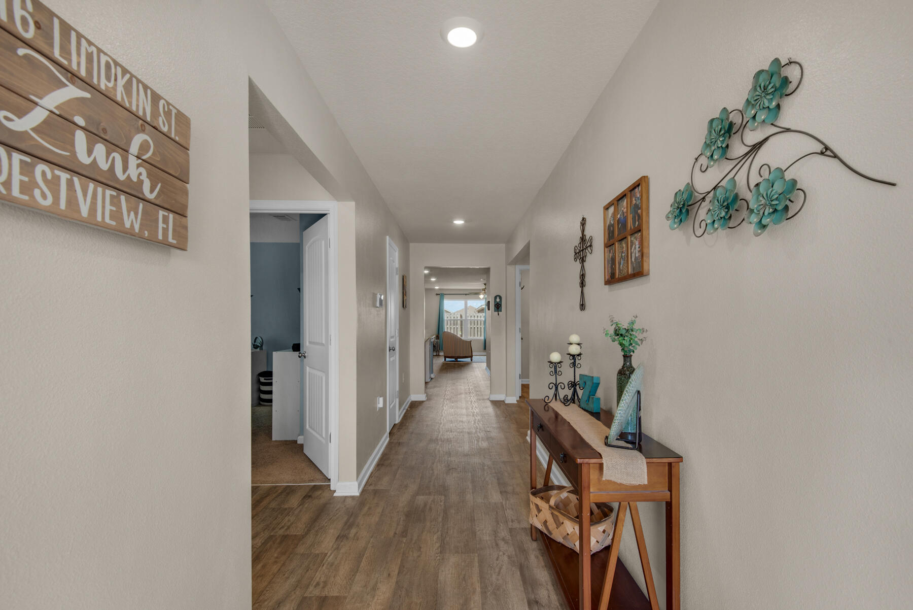 1016 Limpkin Street Crestview, FL 32539 - Photo 14 of 36 a very nice looking room with a wooden floor