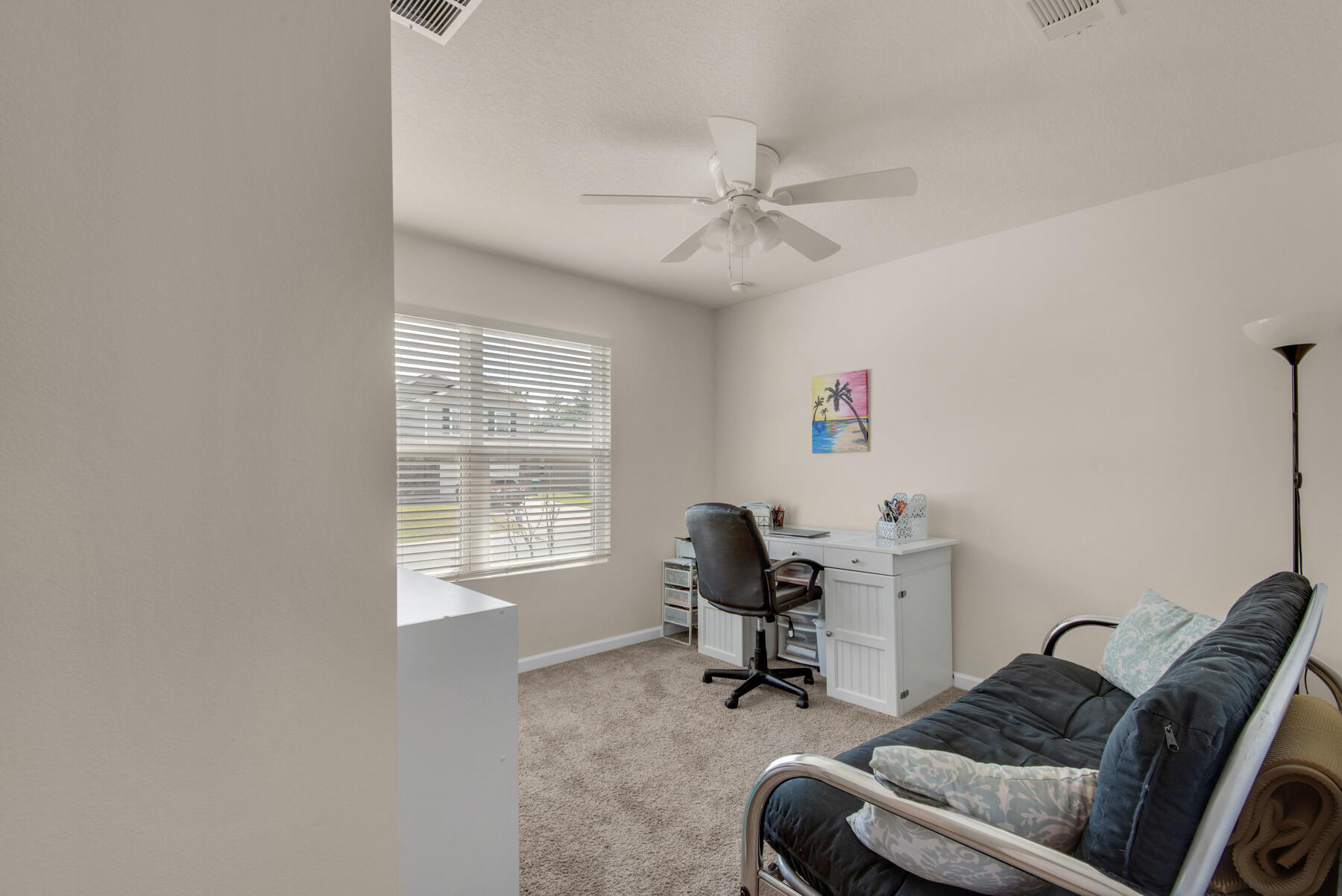 1016 Limpkin Street Crestview, FL 32539 - Photo 24 of 36 a living room with furniture
