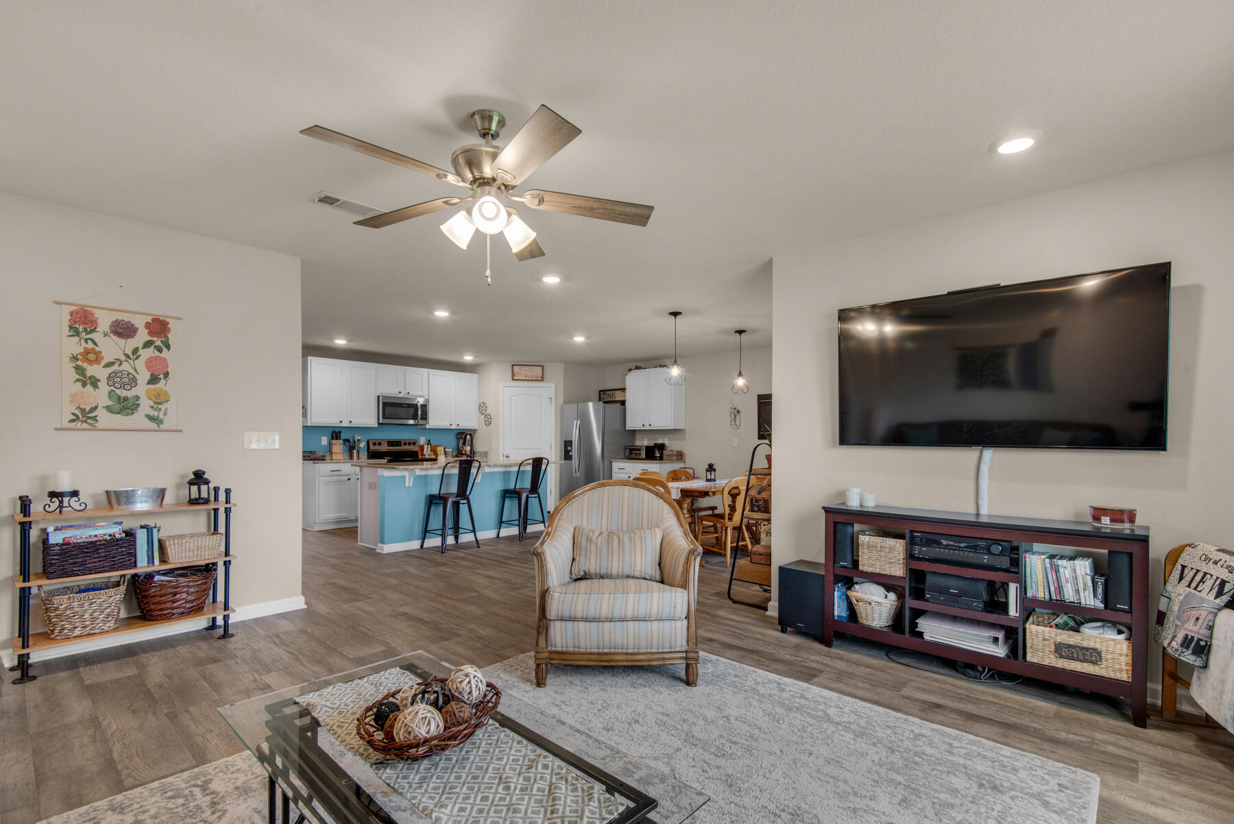 1016 Limpkin Street Crestview, FL 32539 - Photo 10 of 36 a living room with furniture and a flat screen tv