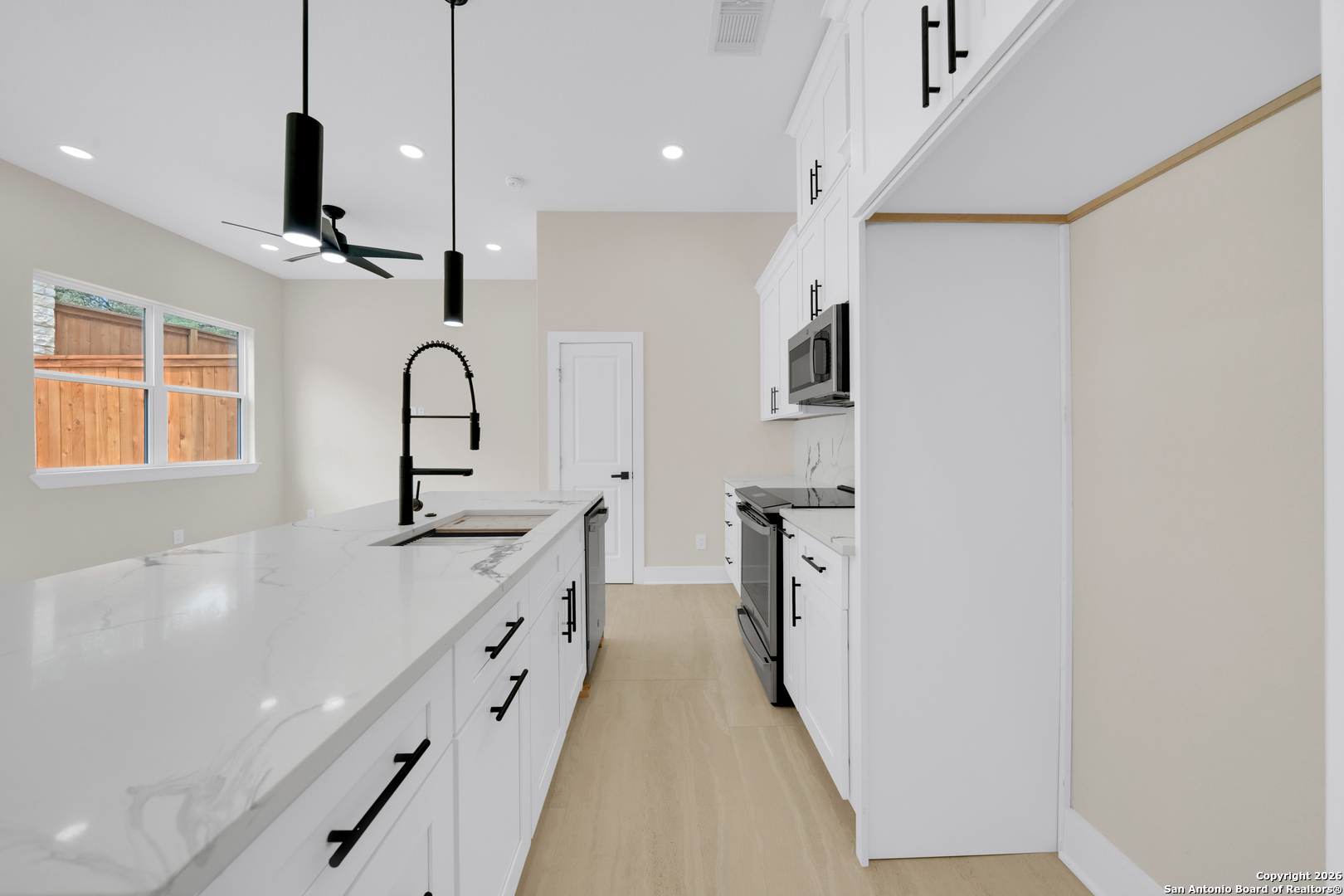 11710 Vance Jackson Road, Unit 702 San Antonio, TX 78230 - Photo 11 of 25 a spacious bathroom with a sink a mirror and shower