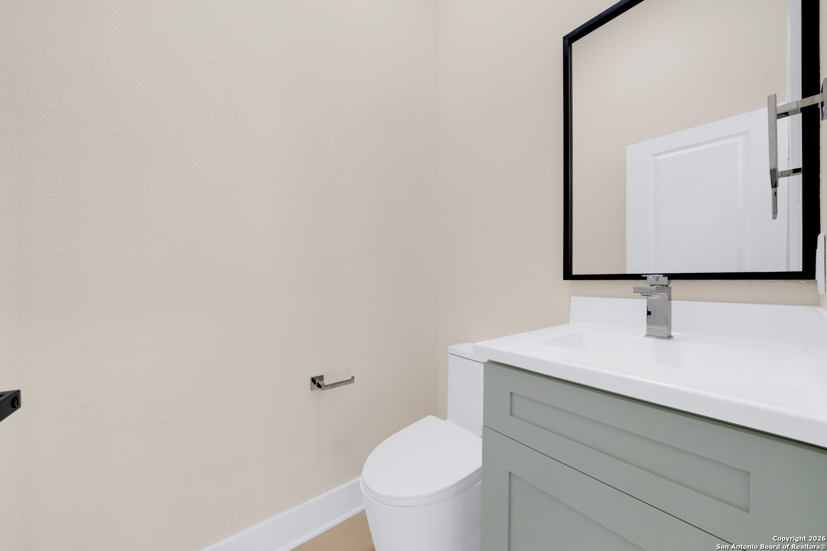11710 Vance Jackson Road, Unit 702 San Antonio, TX 78230 - Photo 17 of 25 a bathroom with a toilet sink and mirror