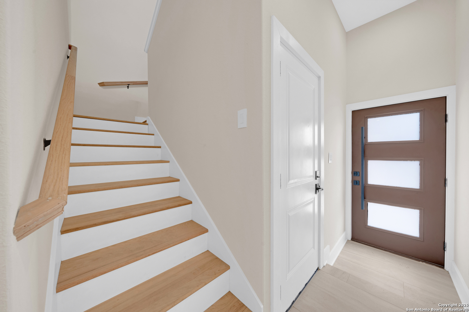 11710 Vance Jackson Road, Unit 702 San Antonio, TX 78230 - Photo 9 of 25 a view of an entryway with staircase
