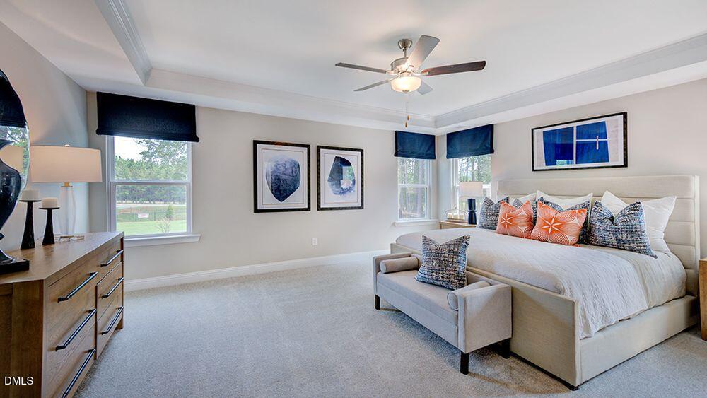 222 Tidal Pool Way Cary, NC 27519 - Photo 16 of 25 a living room with furniture and a flat screen tv
