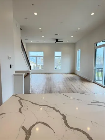 a view of a livingroom with a staircase