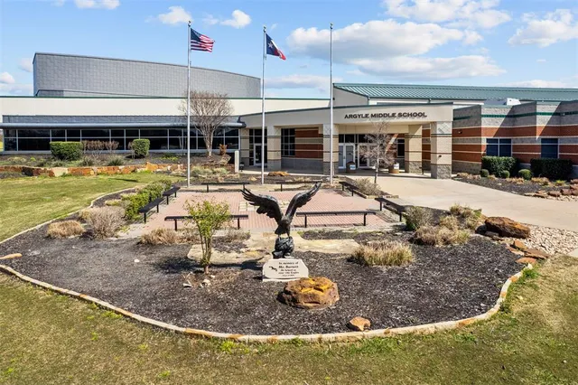 a picture of a building with outdoor seating