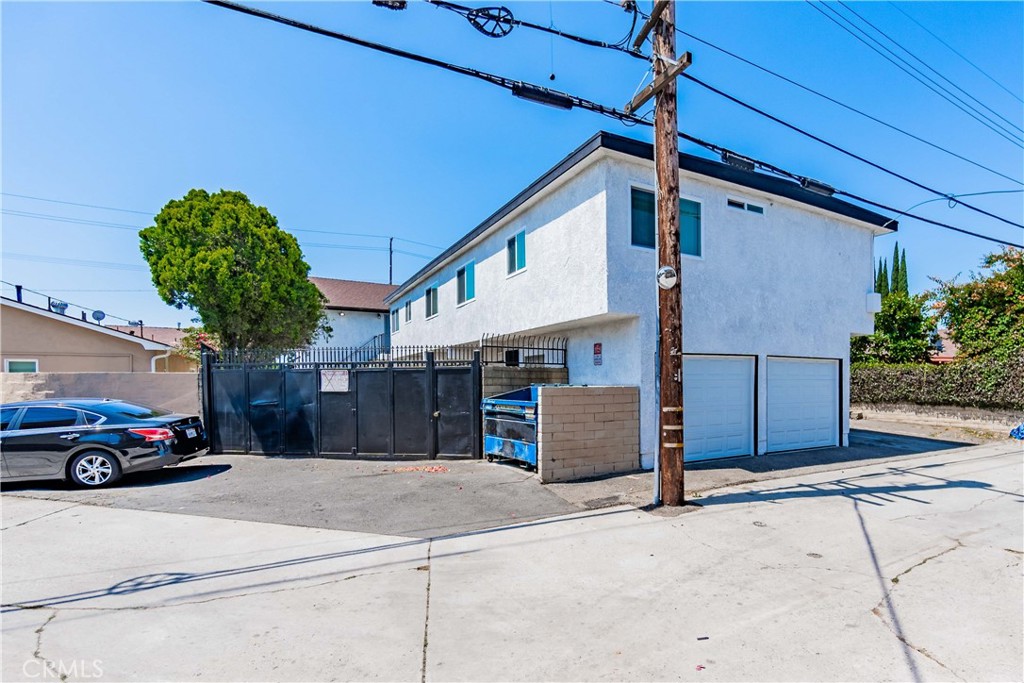 1813 West Ball Road Anaheim, CA 92804 - Photo 34 of 36 a car parked in front of a house