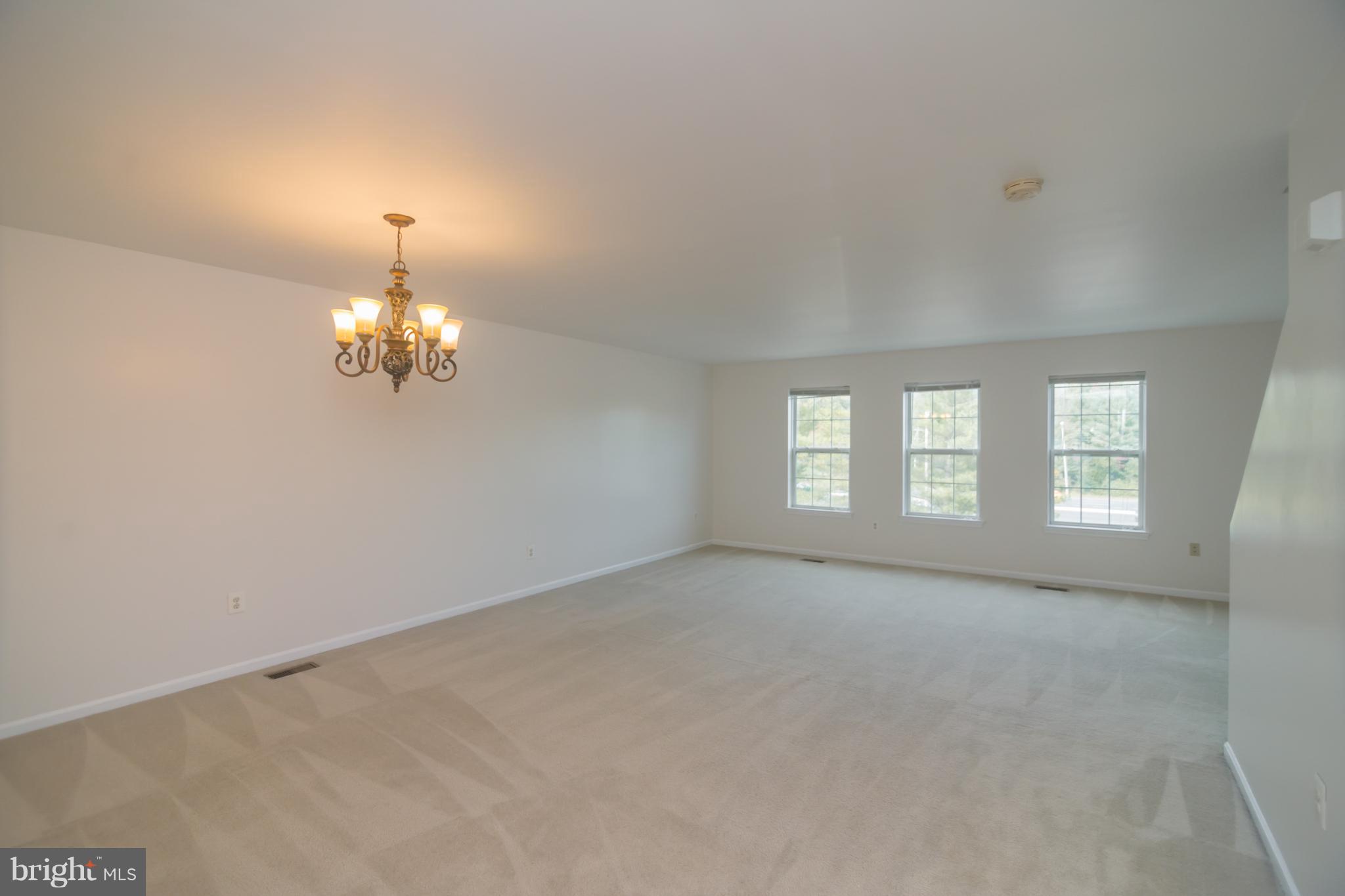 7311 Gateside Place Springfield, VA 22150 - Photo 17 of 30 wooden floor in an empty room with a window