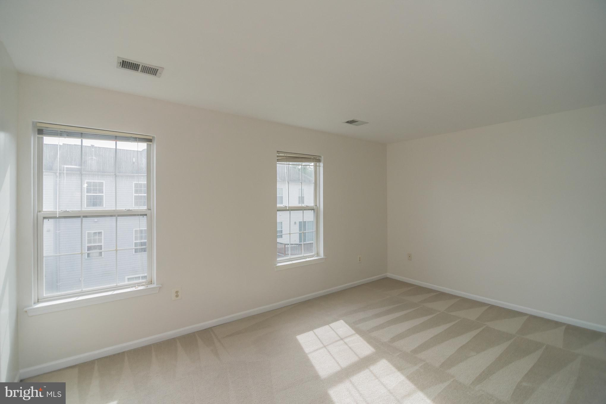 7311 Gateside Place Springfield, VA 22150 - Photo 21 of 30 an empty room with windows