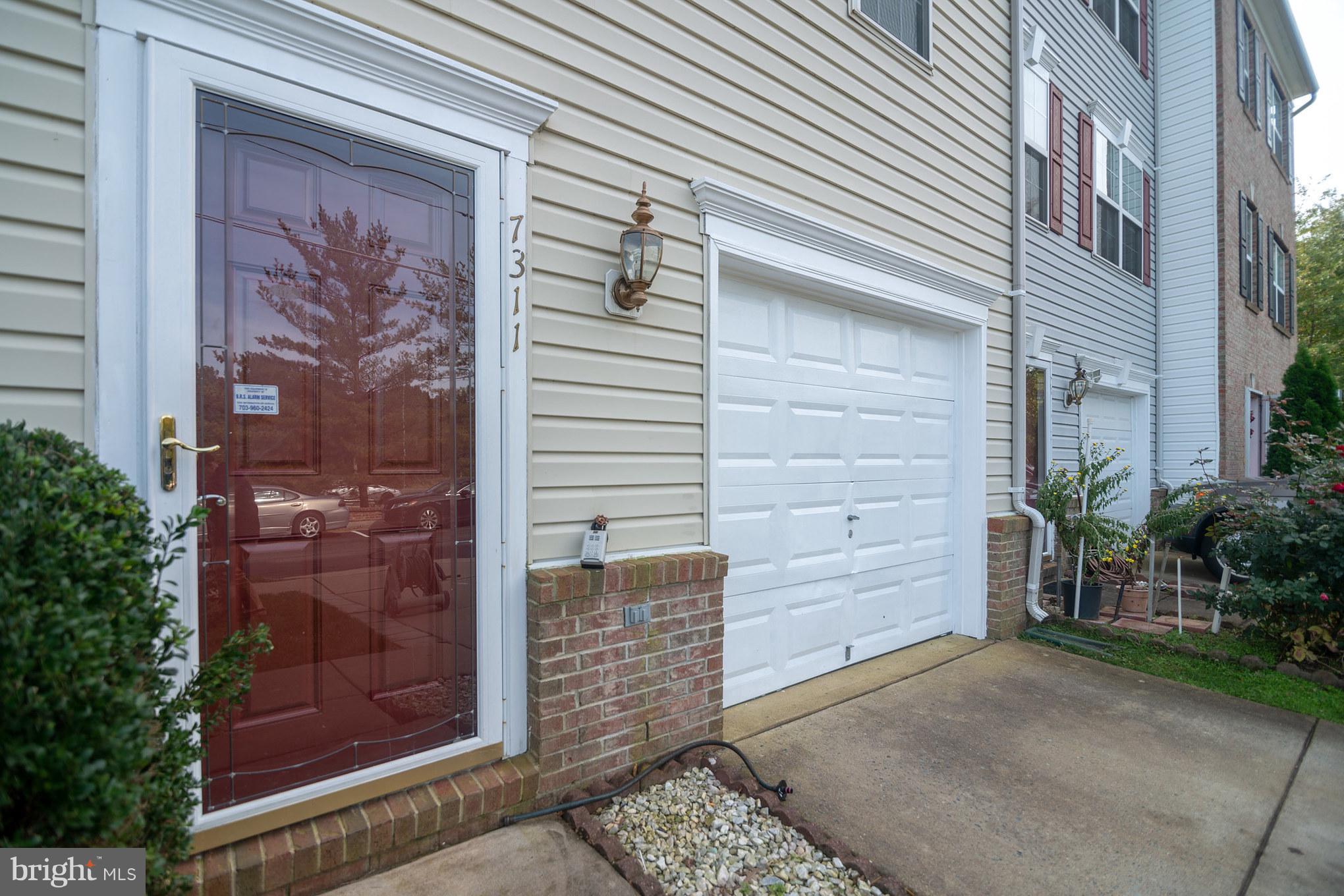 7311 Gateside Place Springfield, VA 22150 - Photo 5 of 30 a view of a door of a house with a door
