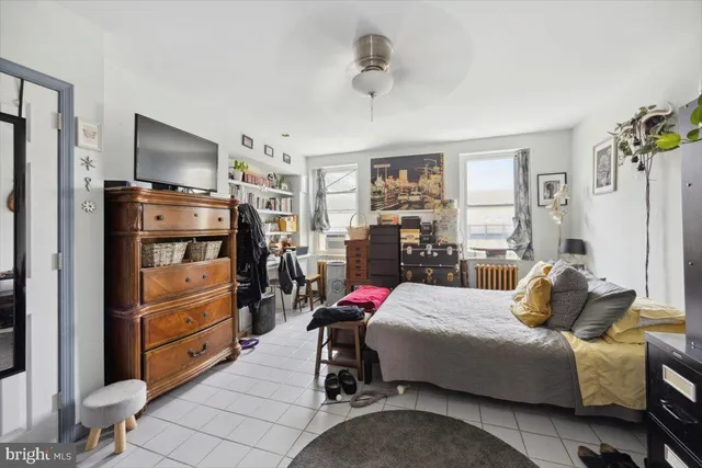 a bedroom with a bed and furniture