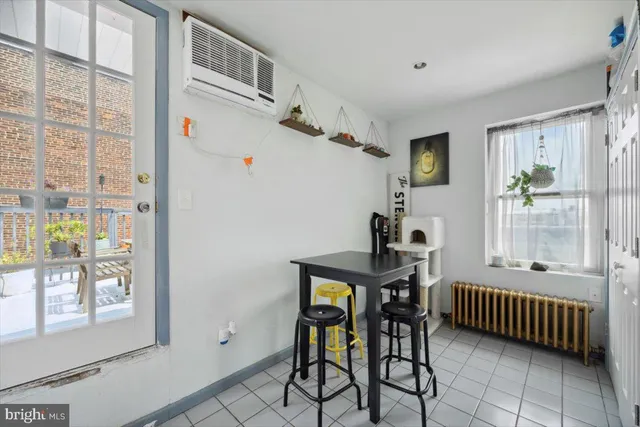 a room that has a table and a chair