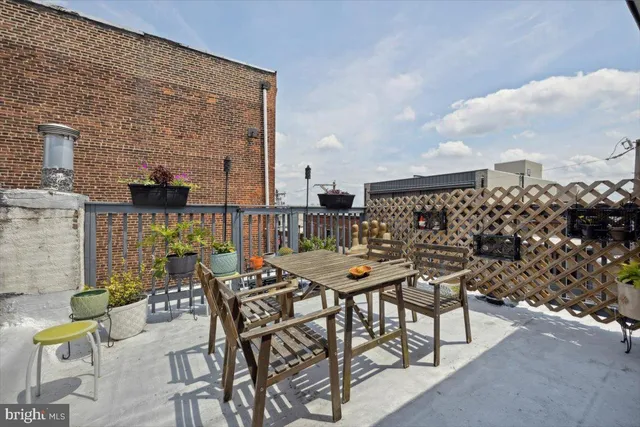 a view of a terrace with furniture